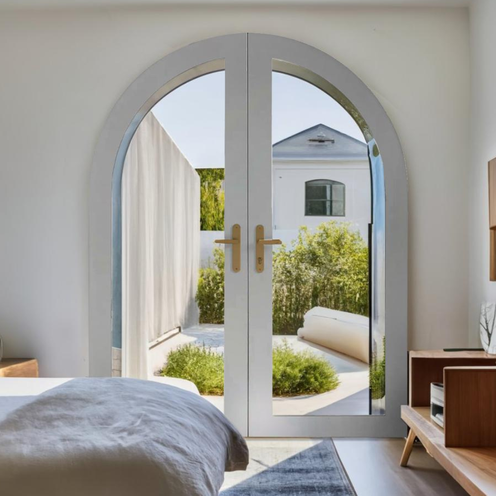 The Appeal and Benefits of Arched Glass Doors