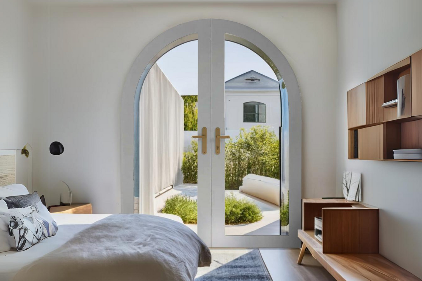 The Appeal and Benefits of Arched Glass Doors